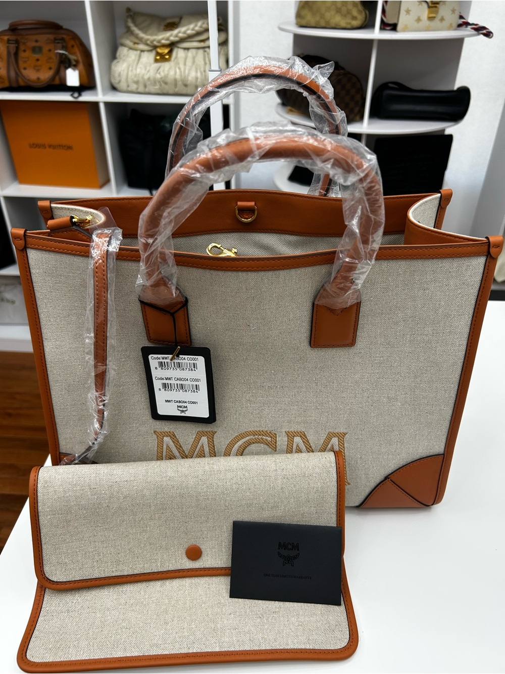 MCM Canvas Tote with Cognac Leather Trim and Gold Hardware